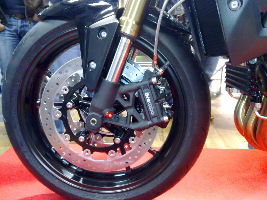 Front brake disc and Brembo brake caliper on a motorcycle