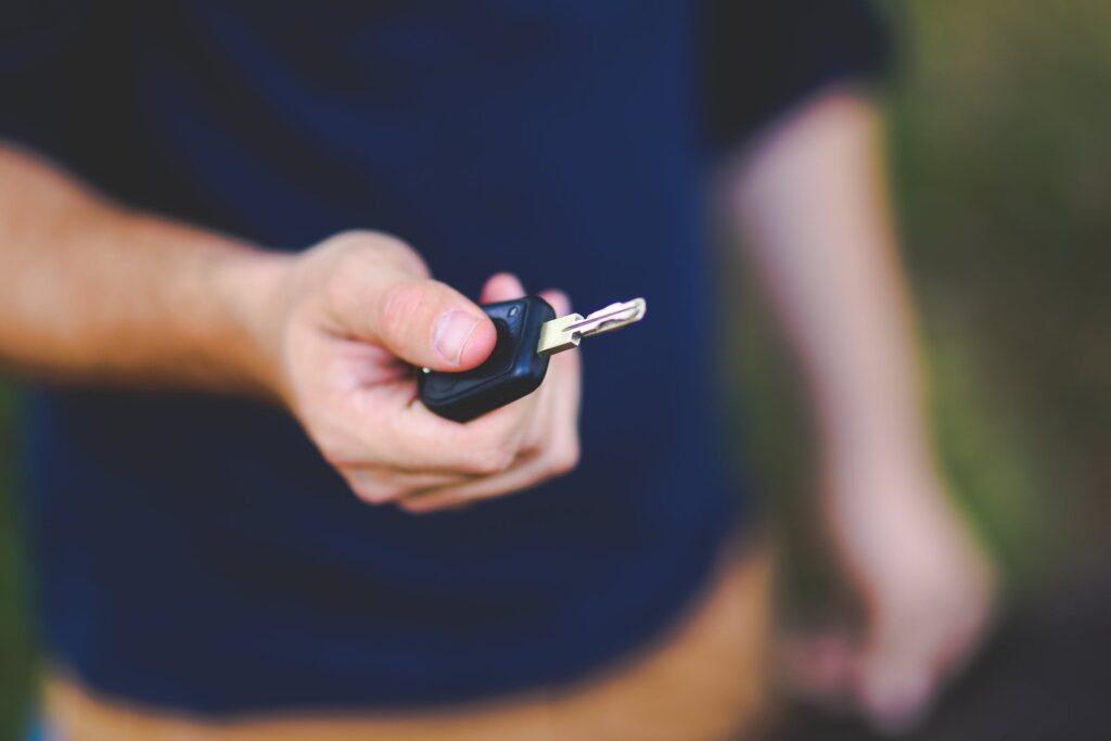 Someone holding car keys